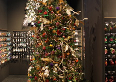 Een kerstboom kan niet missen op een stand van Christmas Inspirations.